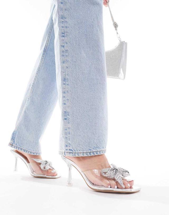 Simmi London Ashleigh clear mid heeled mules with embellished bow in silver Product Image