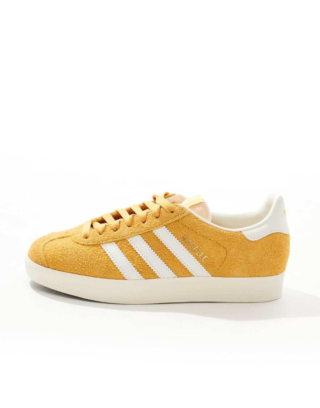 adidas Originals Gazelle sneakers in yellow and white Product Image