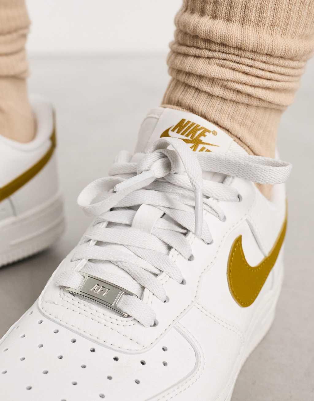 Nike Air Force 1 '07 SE sneakers in white & gold  Product Image