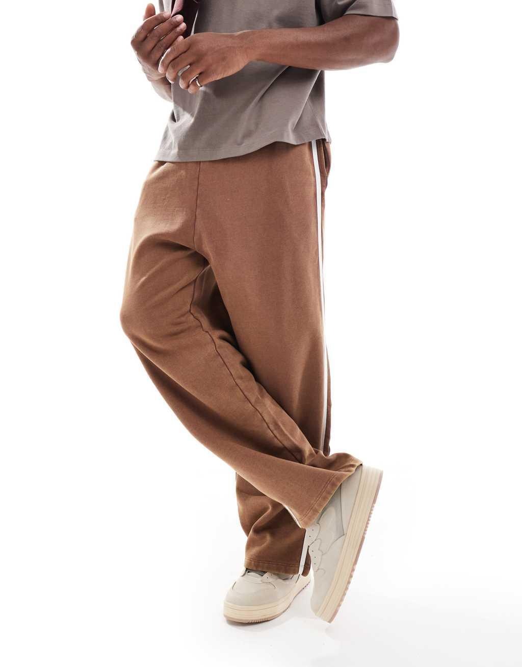 ASOS DESIGN straight leg sweatpants with side stripe in brown Product Image