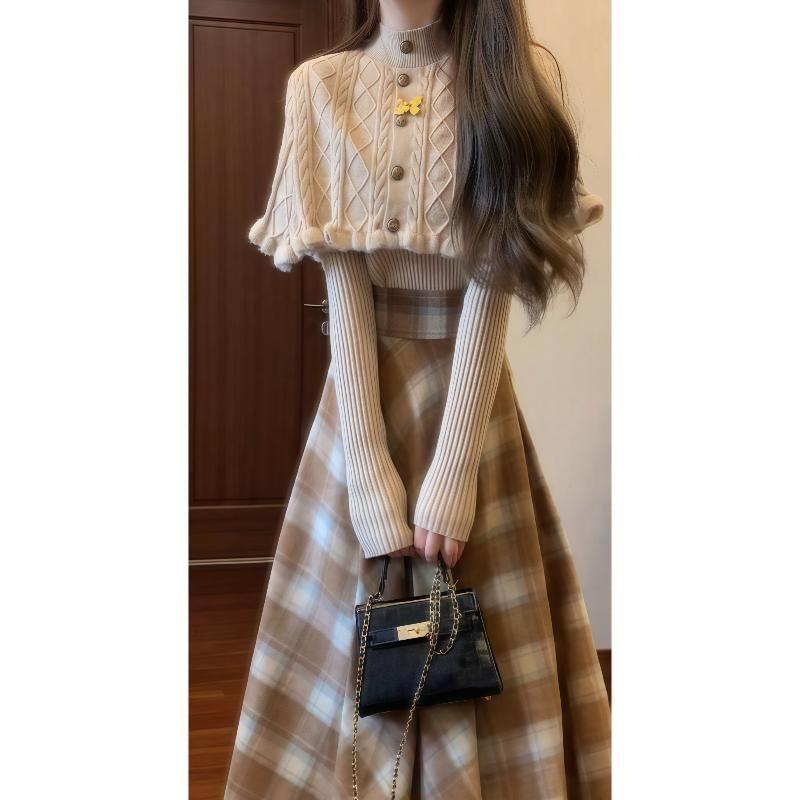 Set: Turtleneck Plain Cable Knit Cape + Ribbed Knit Sweater + High Waist Plaid Midi A-Line Skirt Product Image