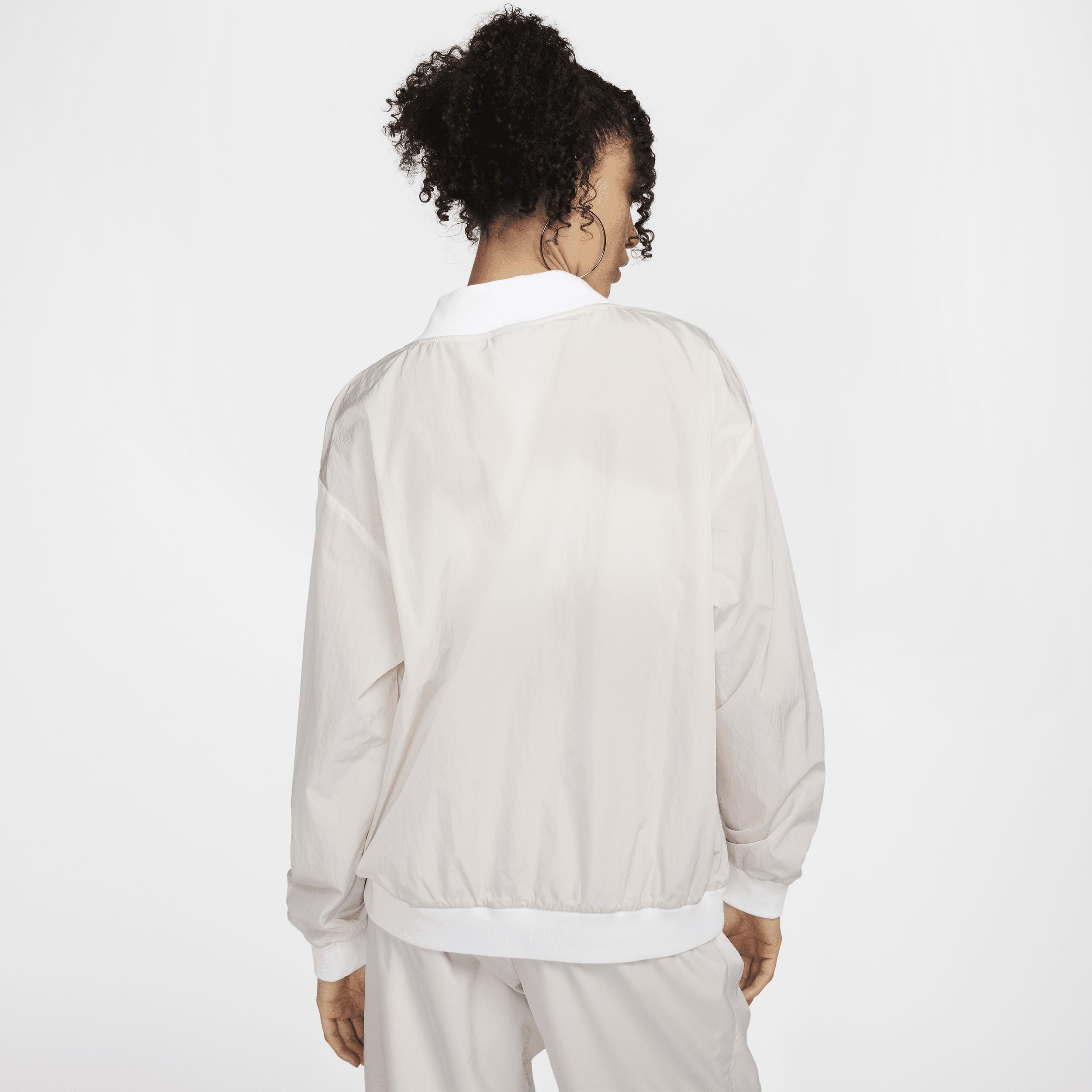 Women's Nike Sportswear Essential Loose UV Woven Long-Sleeve V-Neck Top Product Image