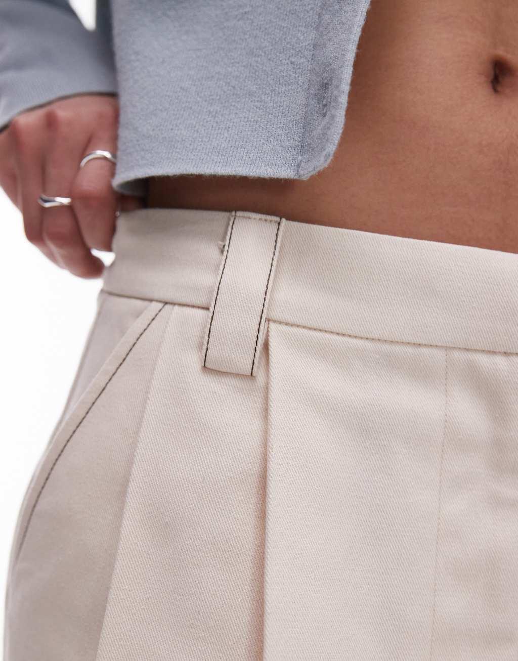 Topshop low rise twill pleat mini skirt with poplin exposed pockets in ivory Product Image