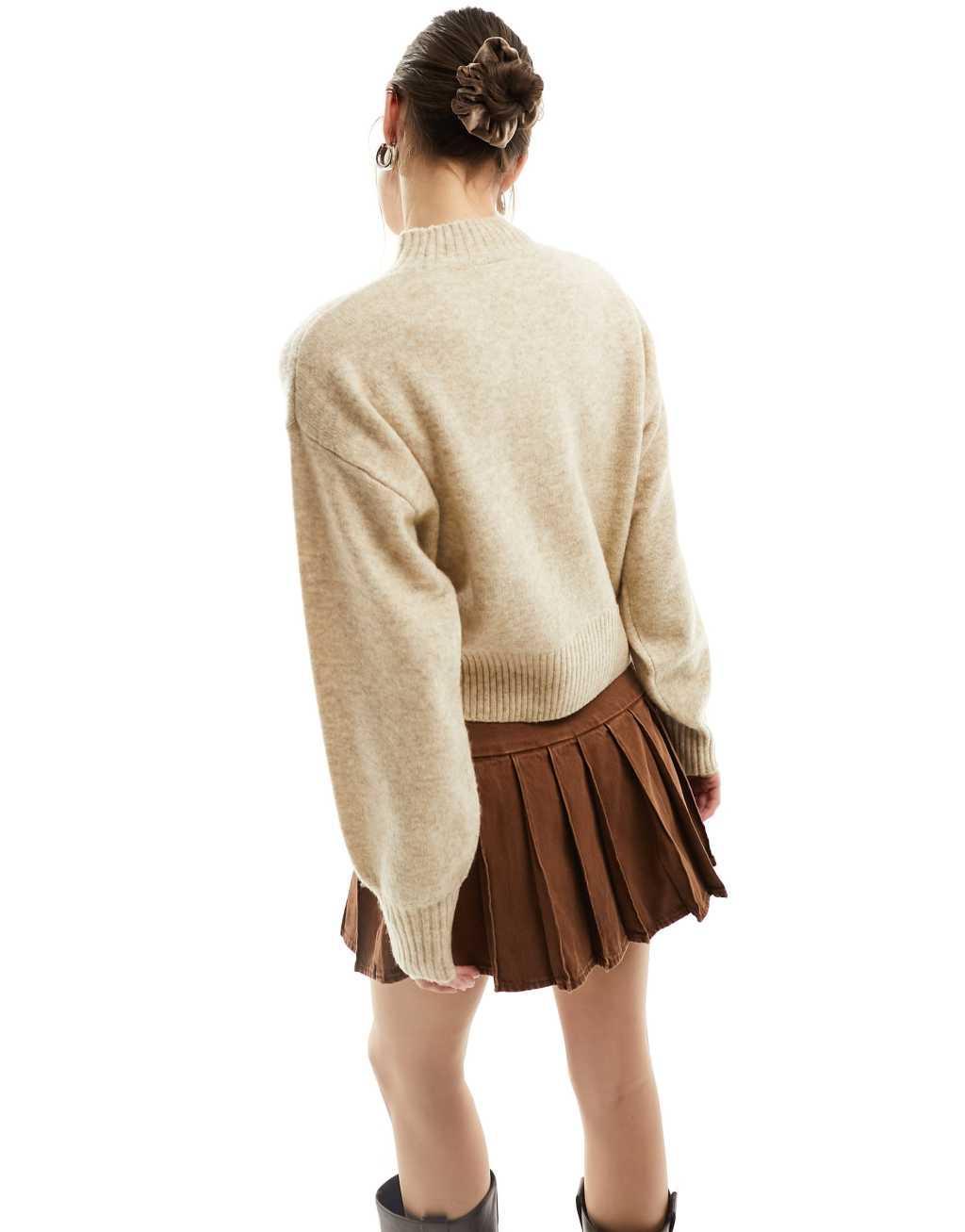 Monki knitted turtleneck sweater in beige Product Image