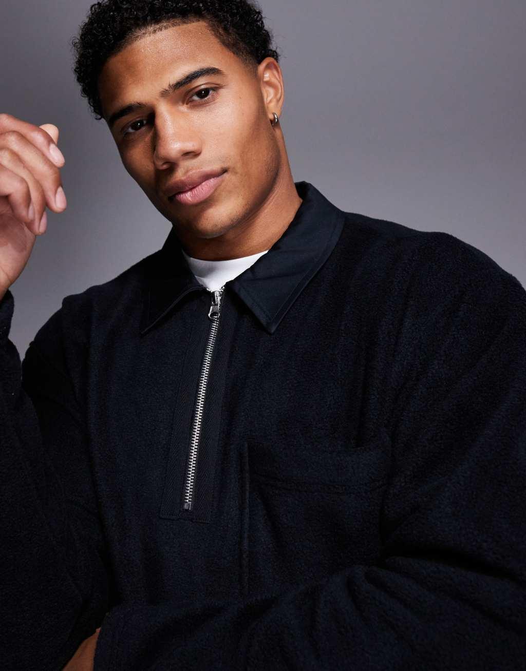 ASOS DESIGN oversized rugby polo fleece sweatshirt with half zip in black Product Image