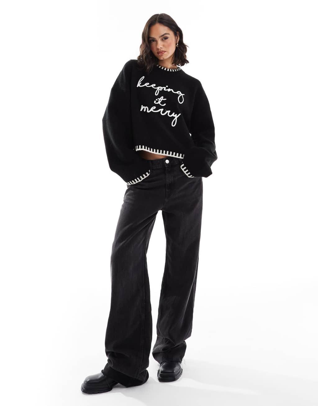 ASOS DESIGN crew neck sweater with blanket stitch and christmas slogan in black and white Product Image