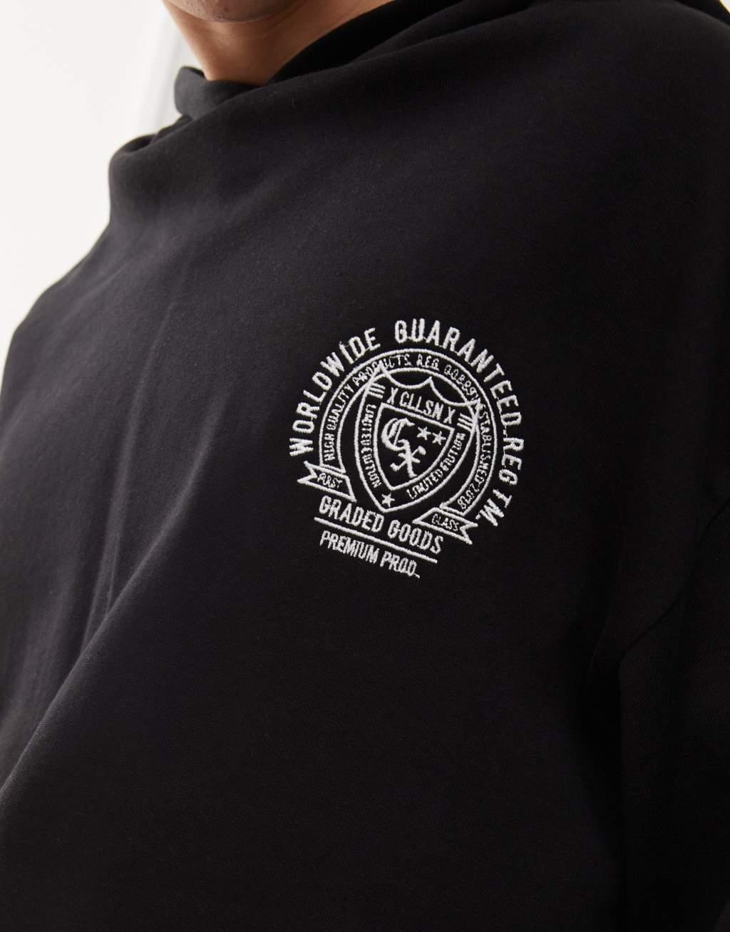 COLLUSION Black boxy cropped hoodie in black with logo emblem  Product Image