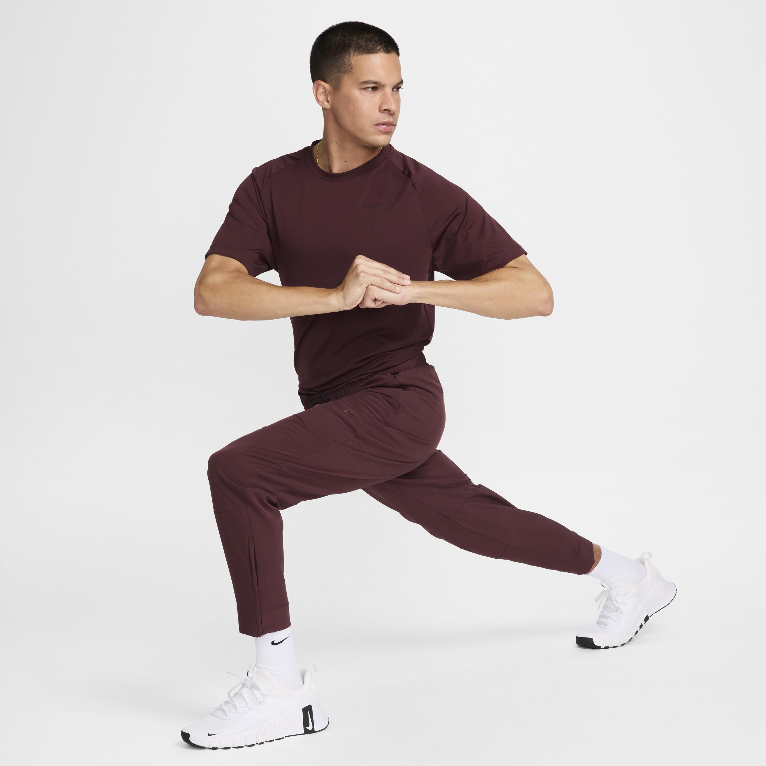 Nike Unlimited Men's Dri-FIT Zippered Cuff Versatile Pants Product Image