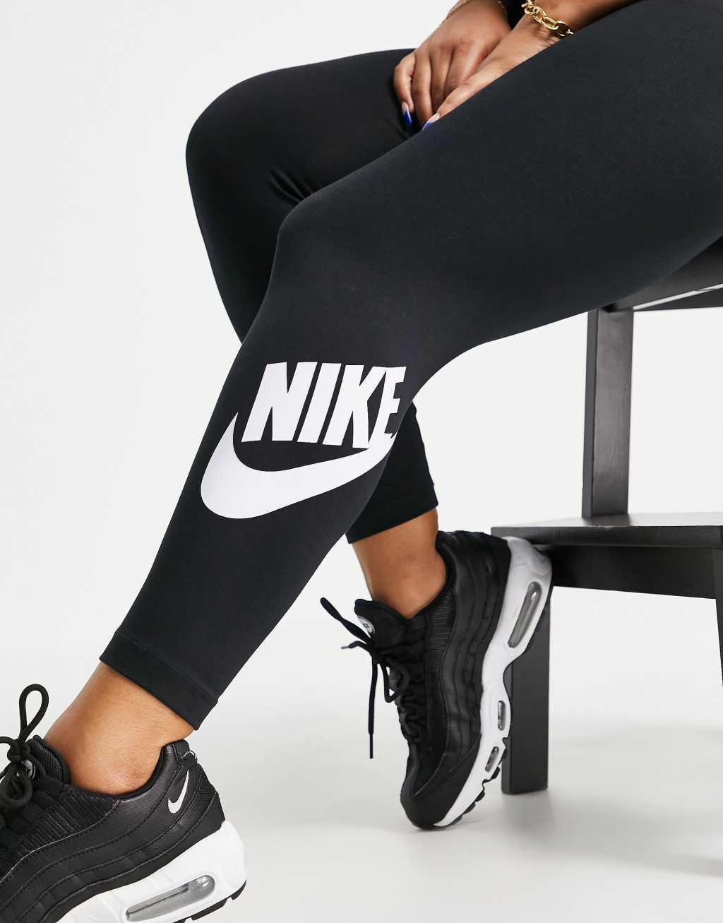 Nike Essential Plus leggings in black Product Image