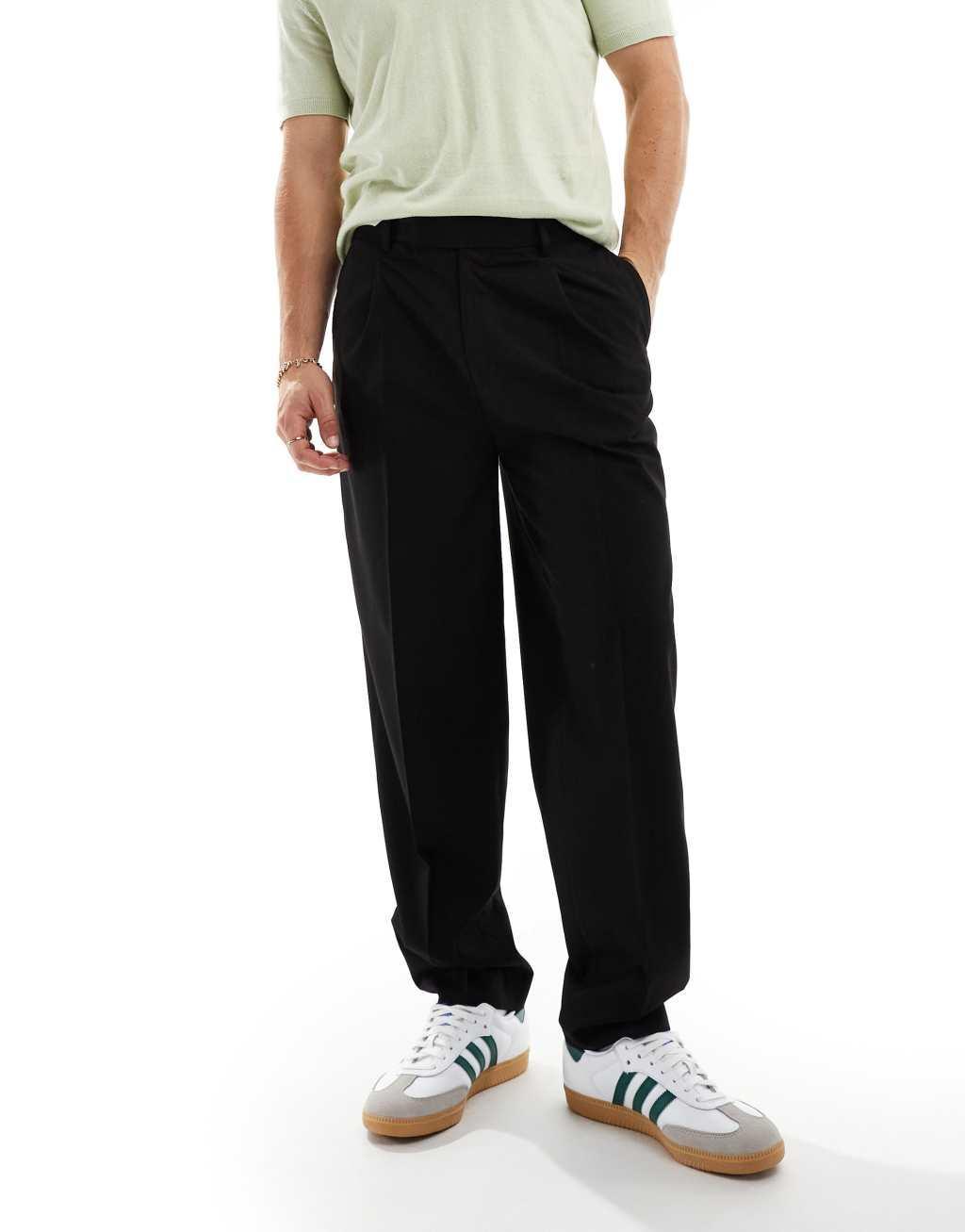 ASOS DESIGN oversized tapered fit dress pants with front pleats in black Product Image