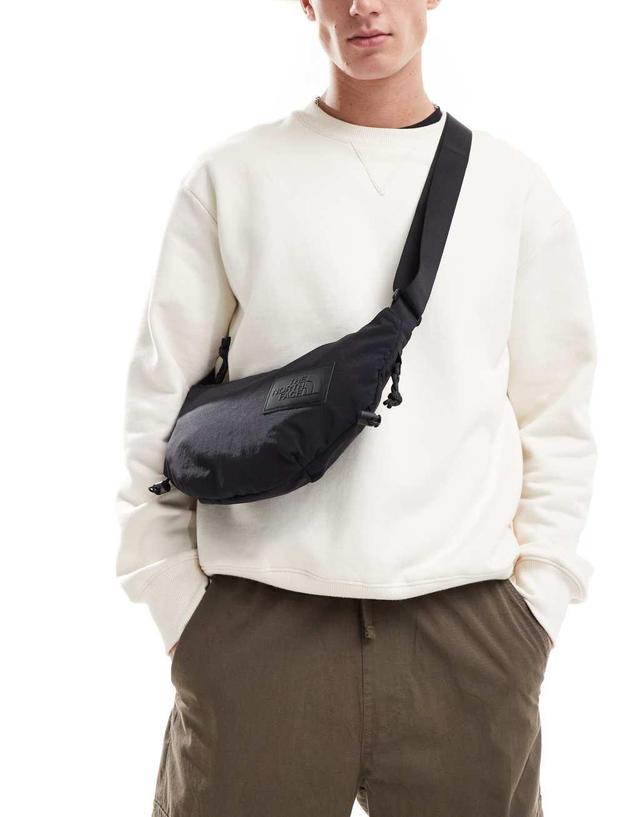 The North Face Never Stop sling cross body bag in black Product Image