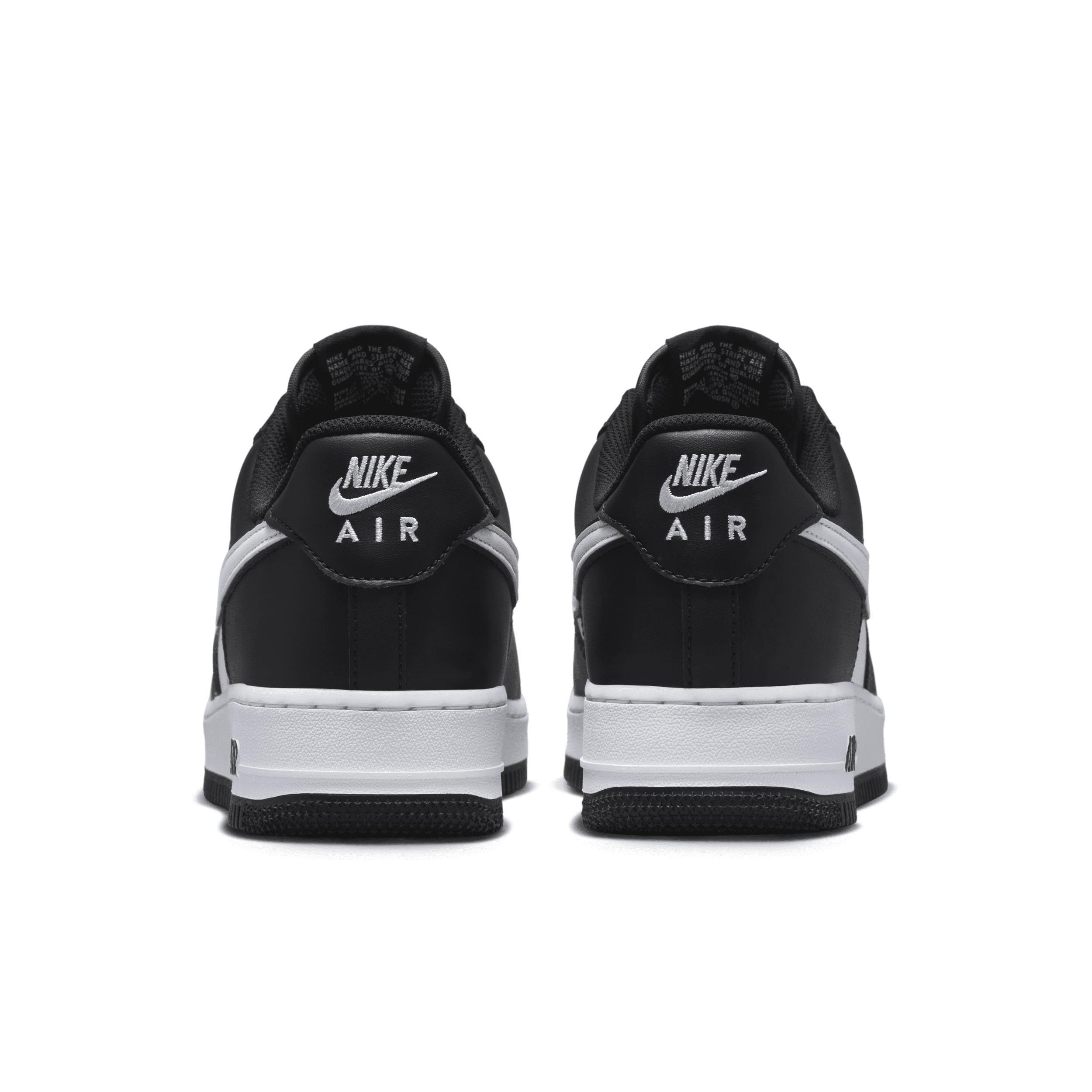 Nike Air Force 1 07 sneakers in white and black Product Image