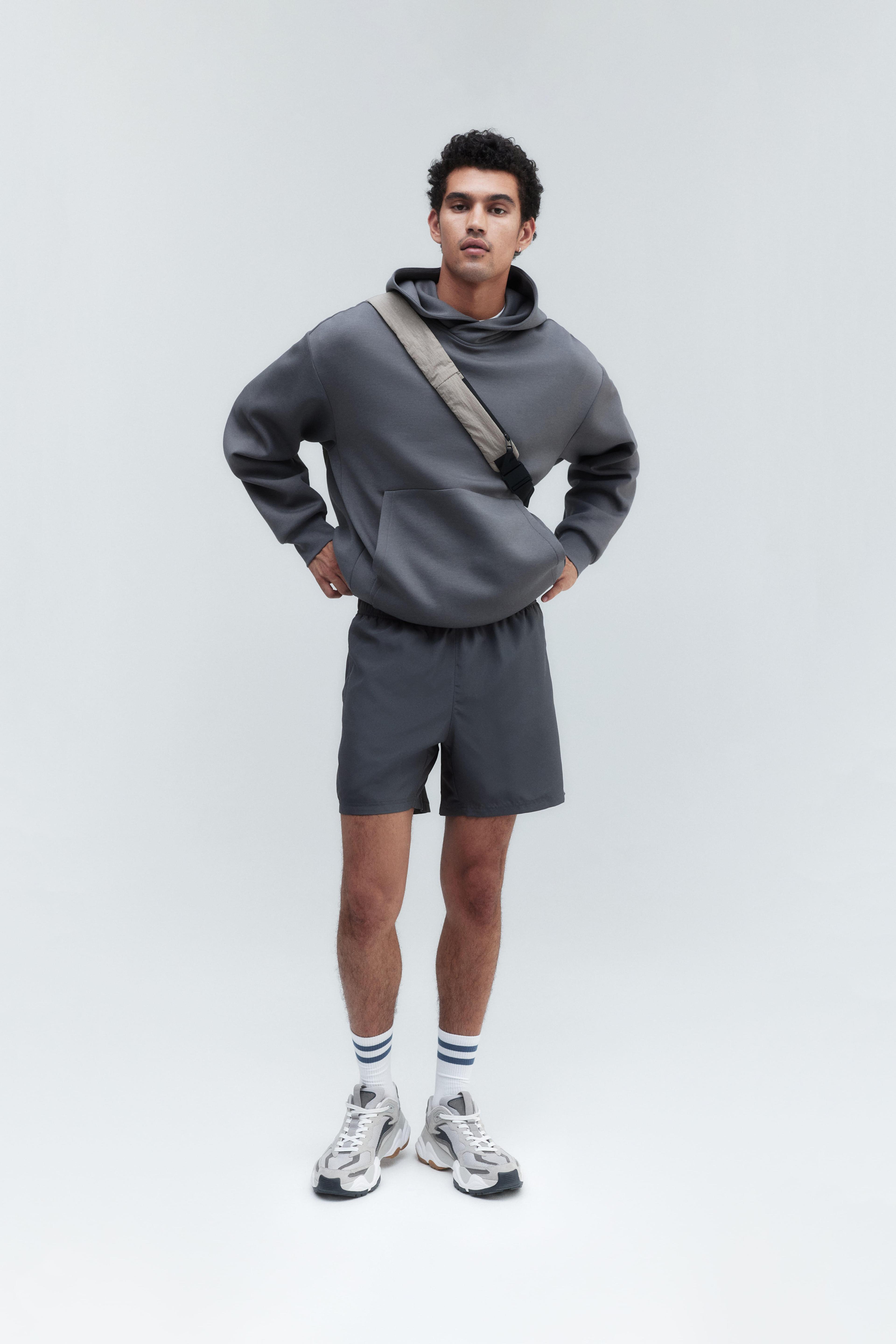 Mid-Length Sports Shorts in DryMove™ Product Image