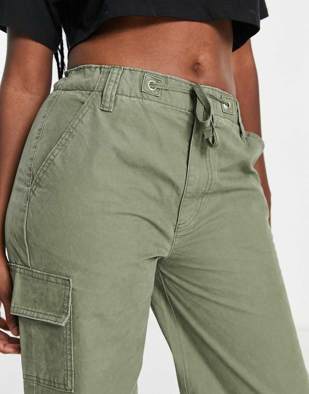 ASOS DESIGN Hourglass oversized cargo pants with multi pocket and tie waist in khaki Product Image