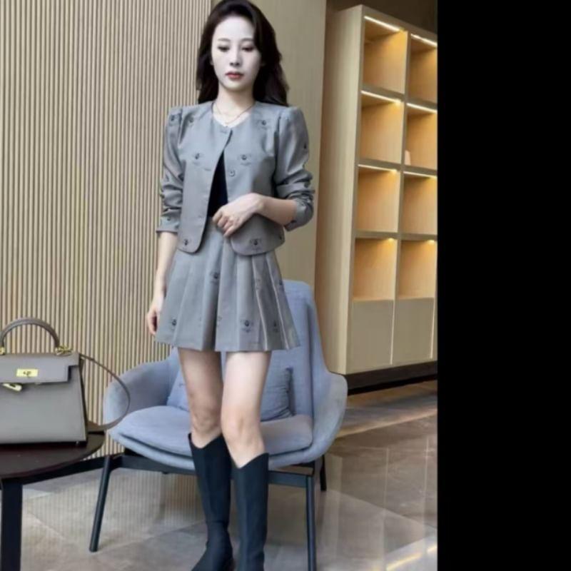 Set: Round Neck Button Jacket + High Waist Mini Pleated Skirt + Cami Top Product Image