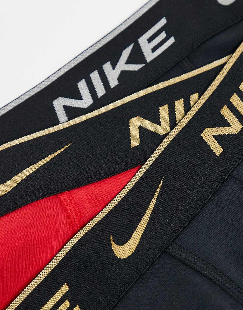 Nike Everyday Cotton Stretch 3-pack trunks in black/red with gold waistband Product Image