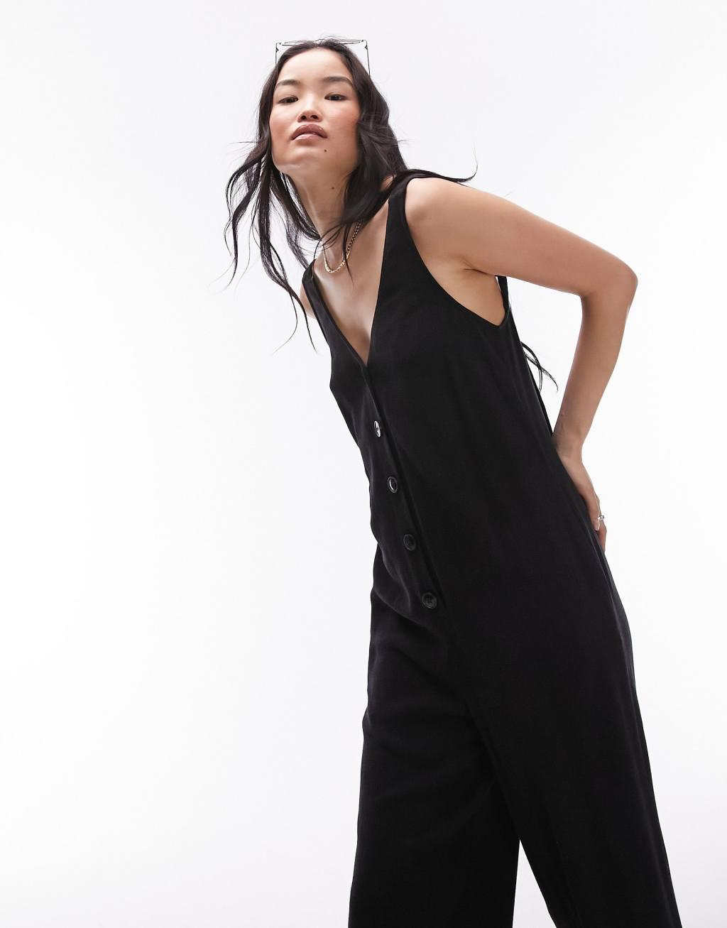 Topshop v neck button down knotted strap jumpsuit in black Product Image