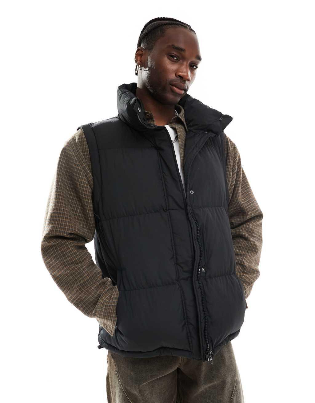 Reclaimed Vintage puffer vest in black Product Image