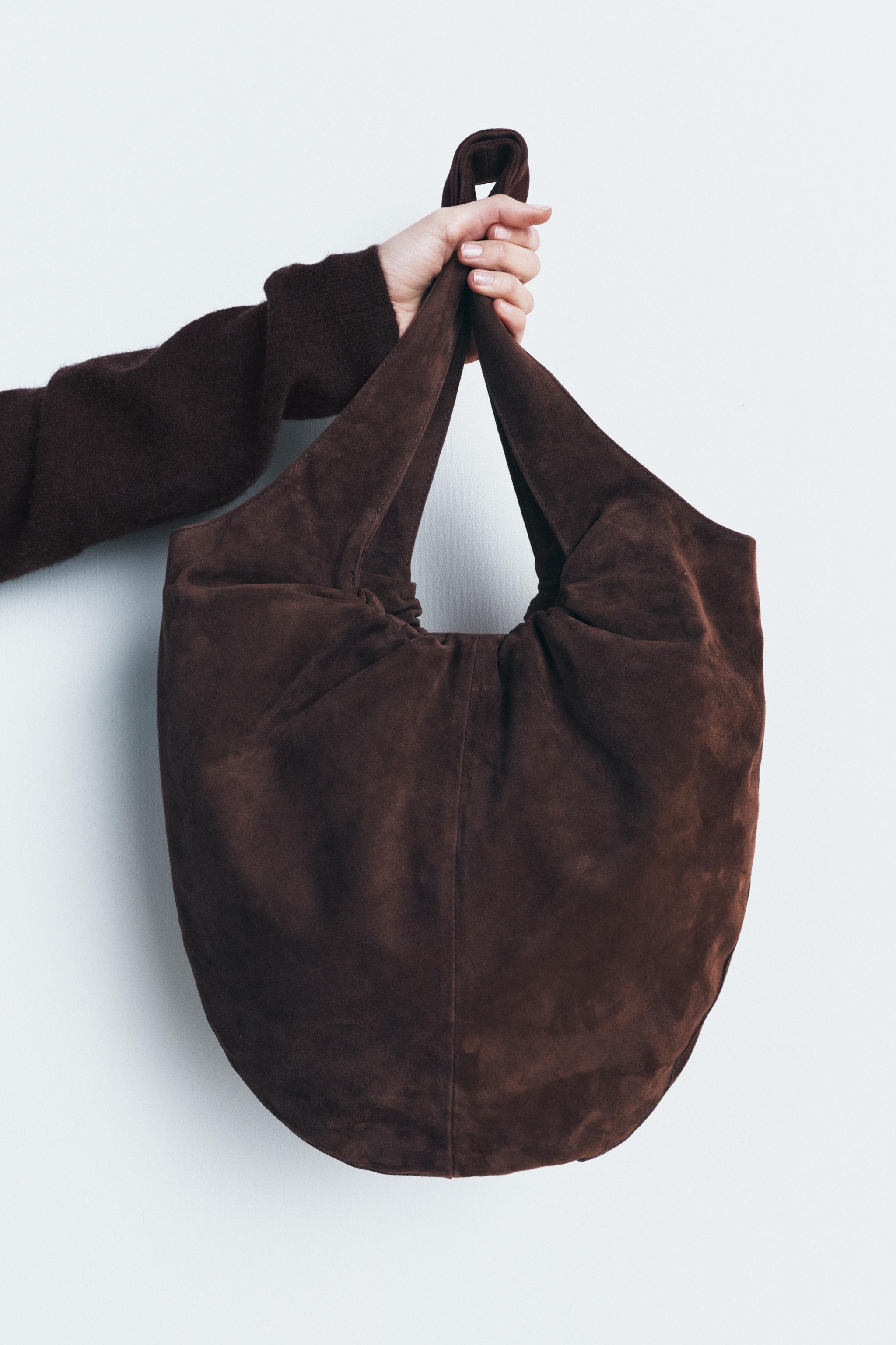 GATHERED SUEDE BUCKET BAG Product Image