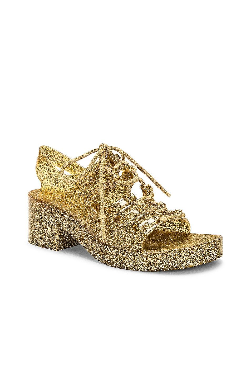 Bottega Veneta Jelly Lace Up Sandal in Gold - Metallic Gold. Size 37 (also in 38). Product Image