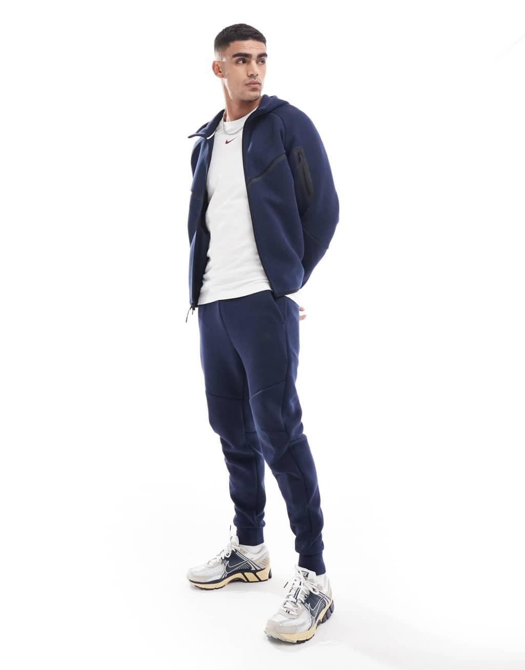 Nike Tech Fleece cuffed sweatpants in navy Product Image