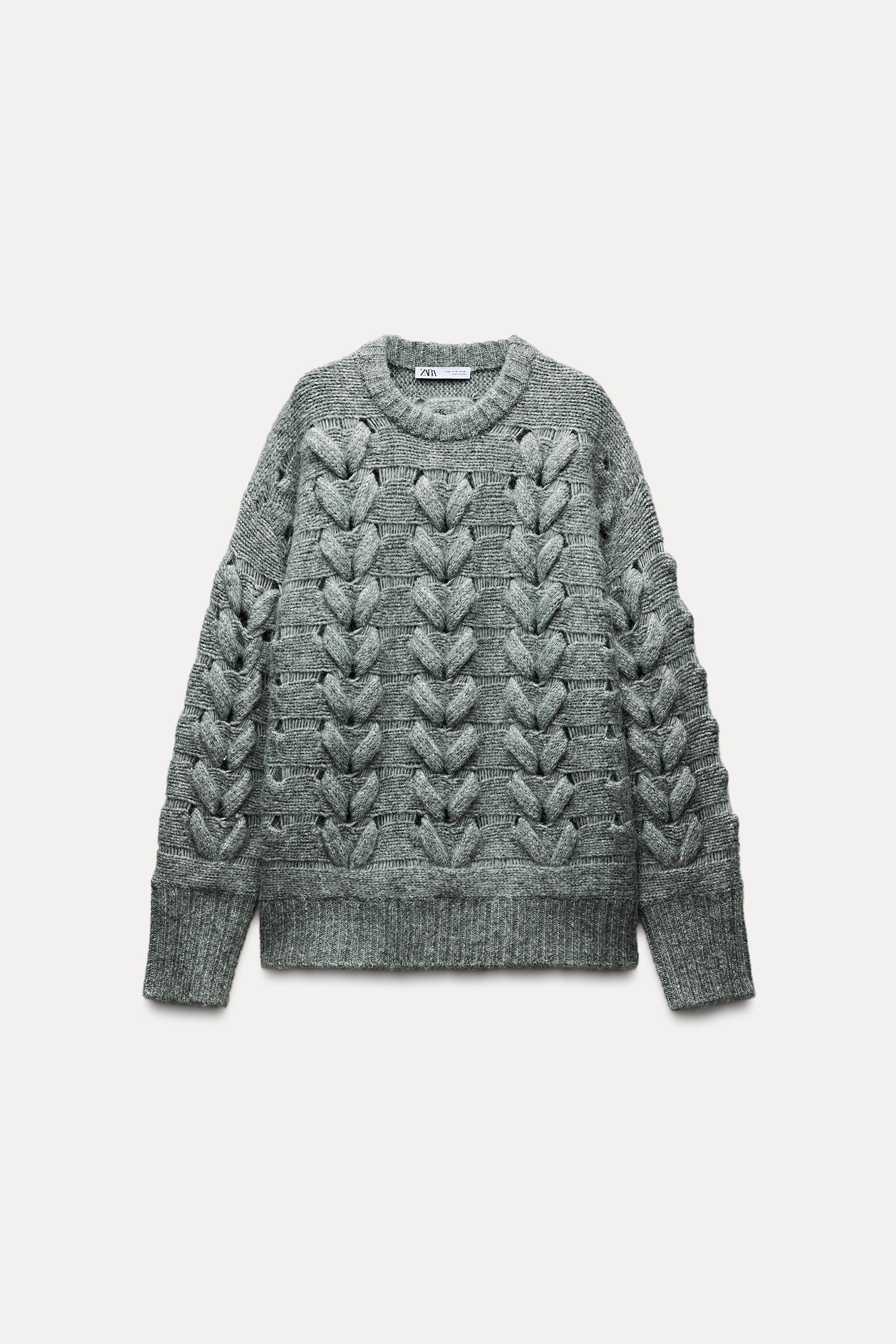 CABLE KNIT SWEATER Product Image