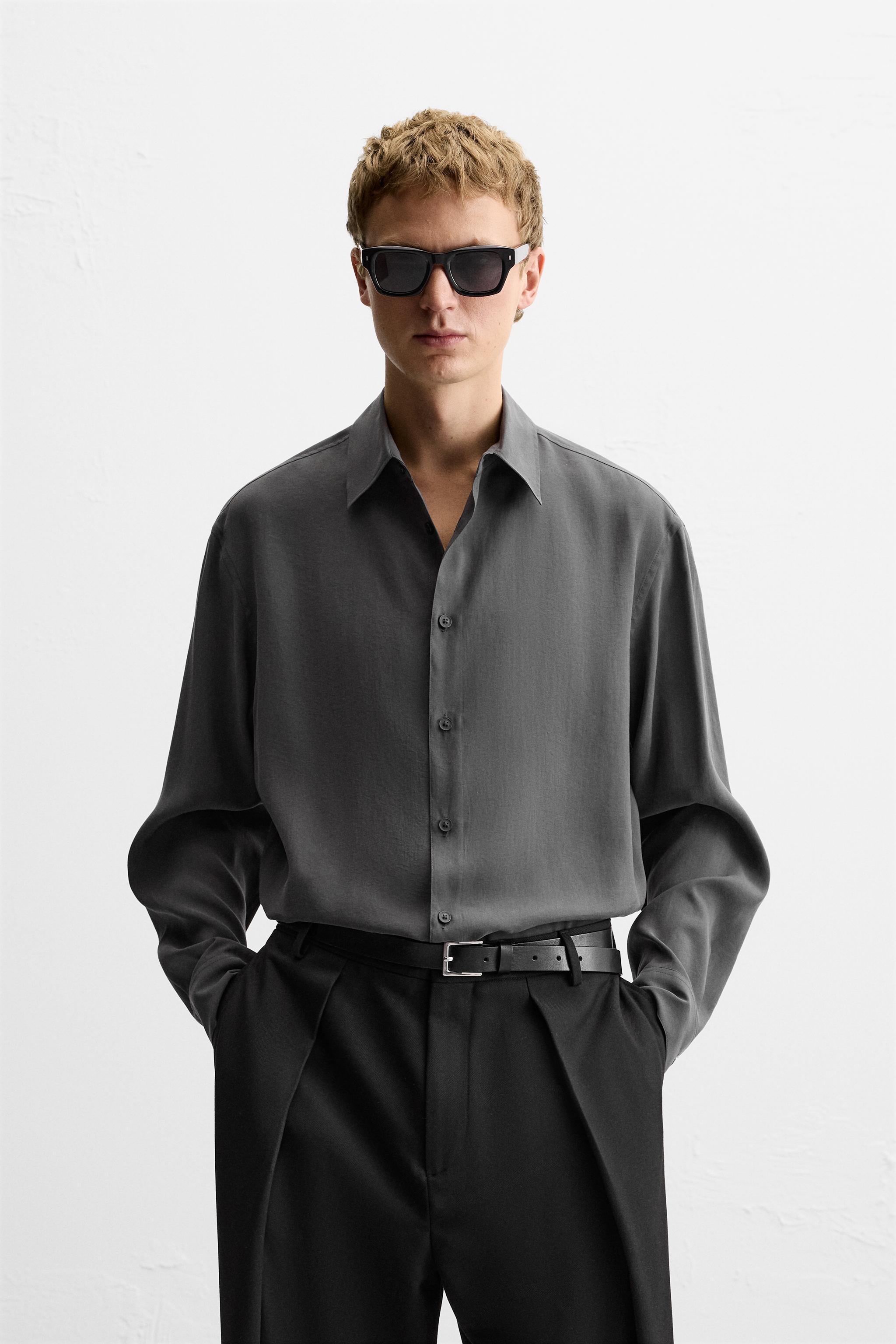 Relaxed fit shirt made of modal blend fabric. Lapel collar and long sleeves with buttoned cuffs. Front button closure. Product Image