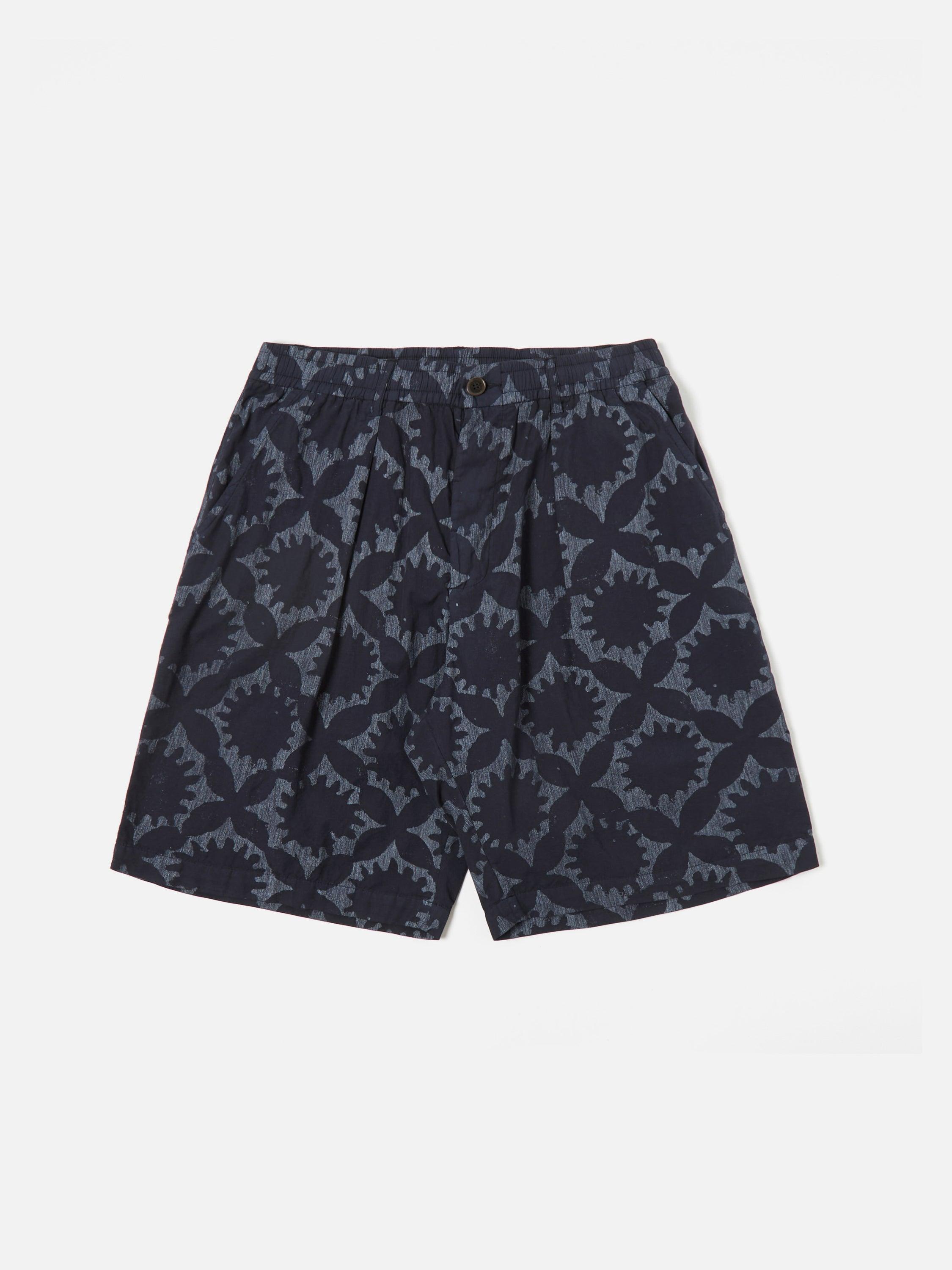 Universal Works Pleated Track Short in Navy Over Dyed Sun Print Product Image