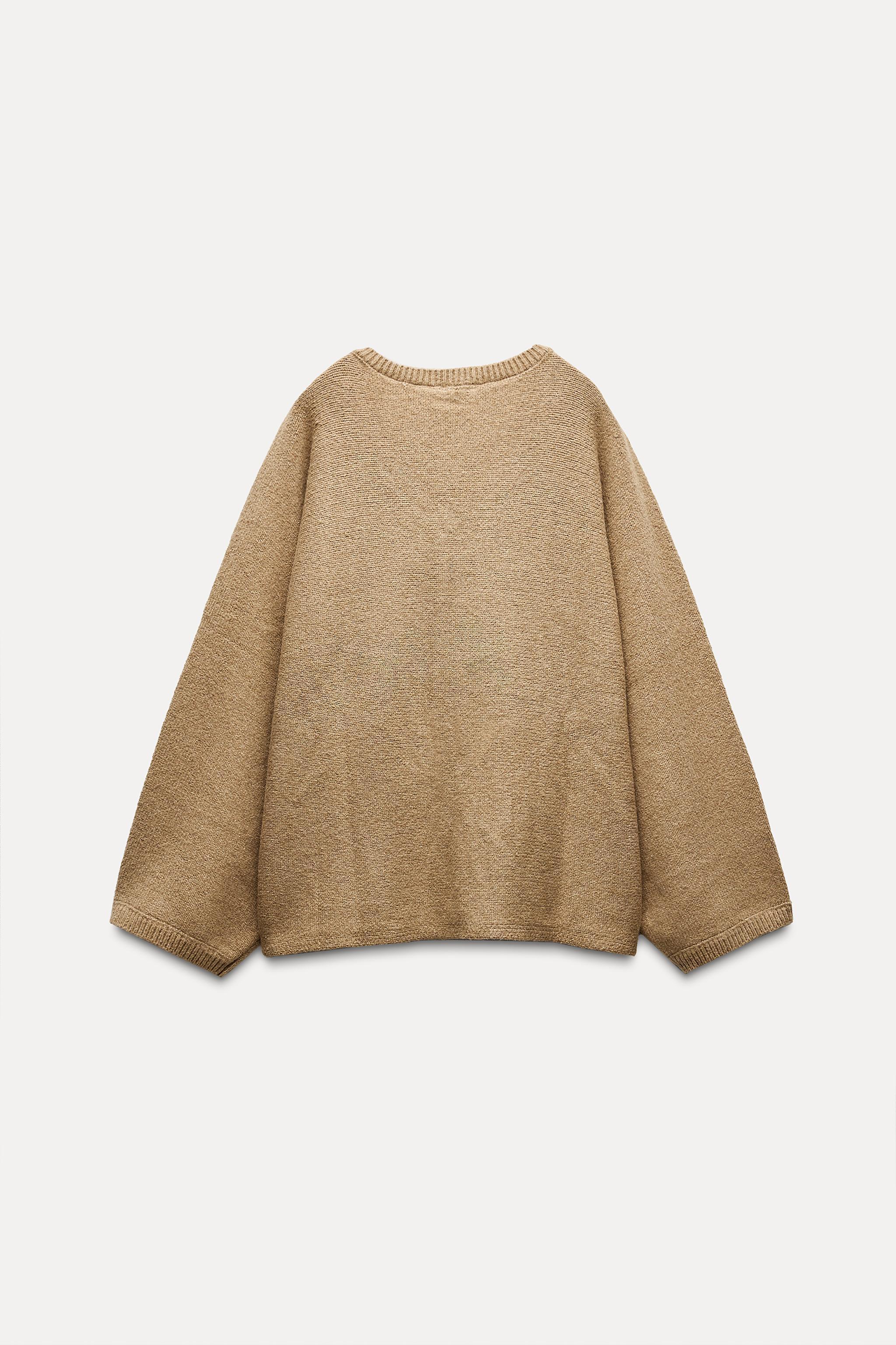 KNIT SWEATER WITH GOLDEN APPLIQUÉ Product Image