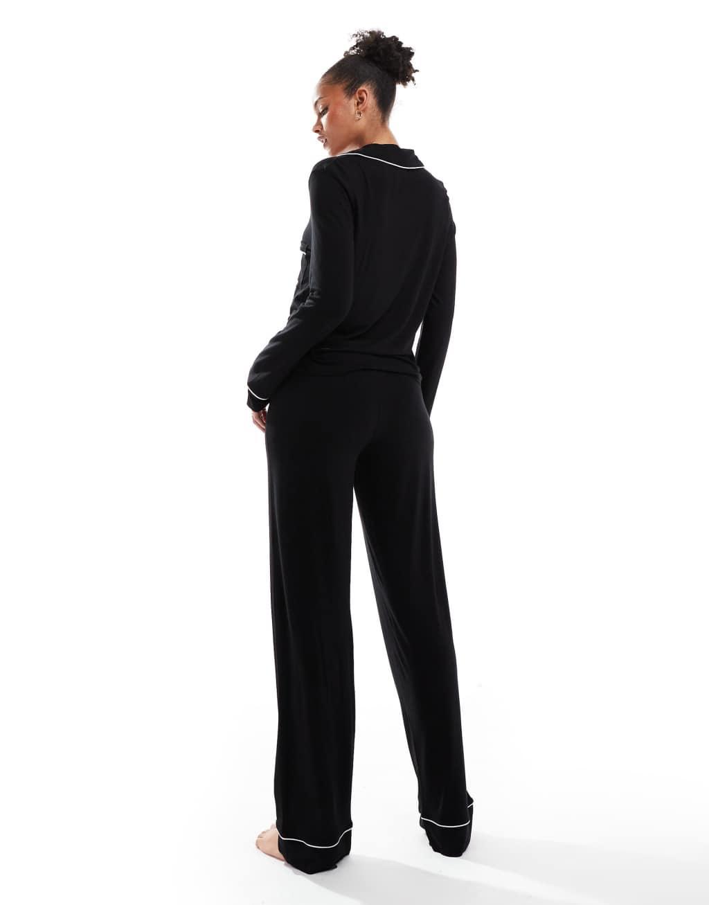 ASOS DESIGN Tall super soft long sleeve shirt & pants pajama set with contrast piping in black Product Image