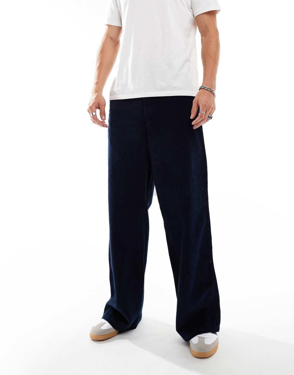 ASOS DESIGN super baggy fit corduroy pants in navy Product Image