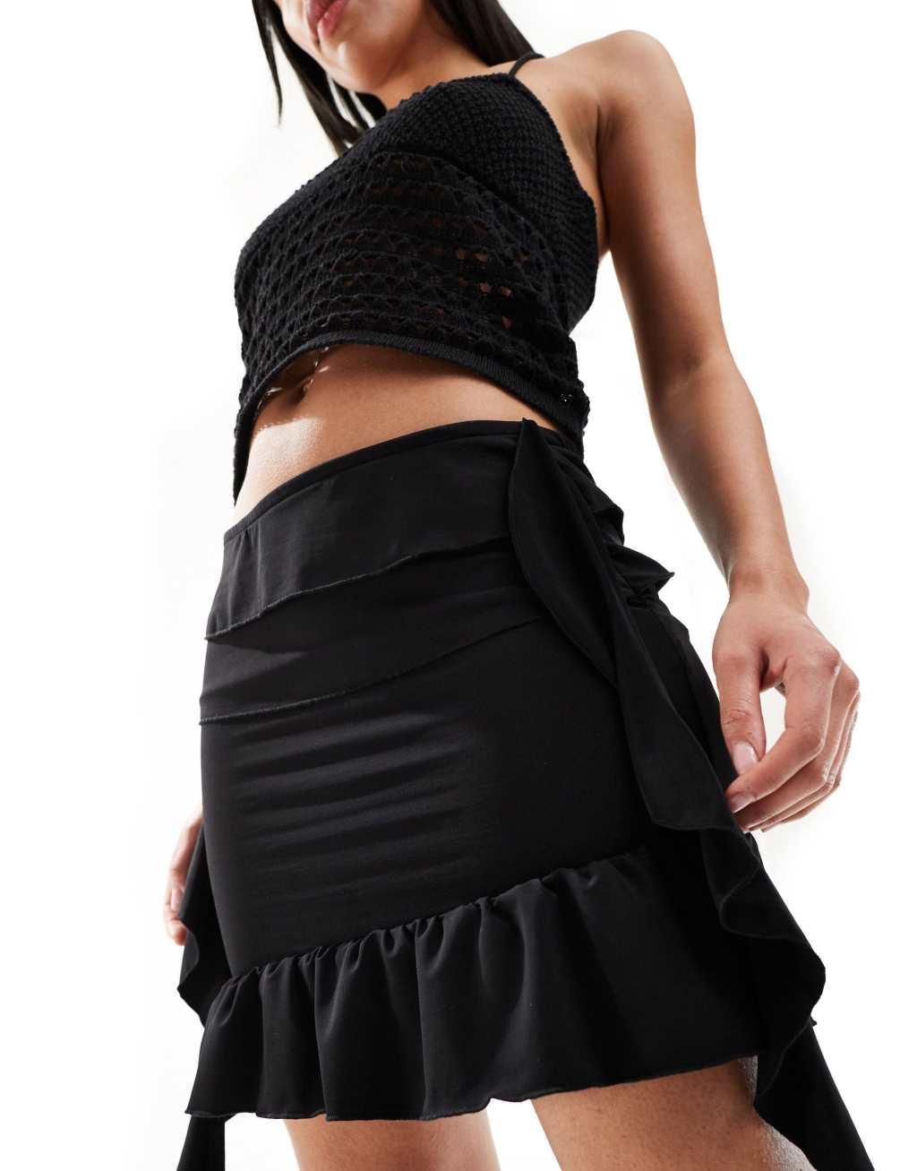 Pieces Festival frill detail mini skirt in black Product Image