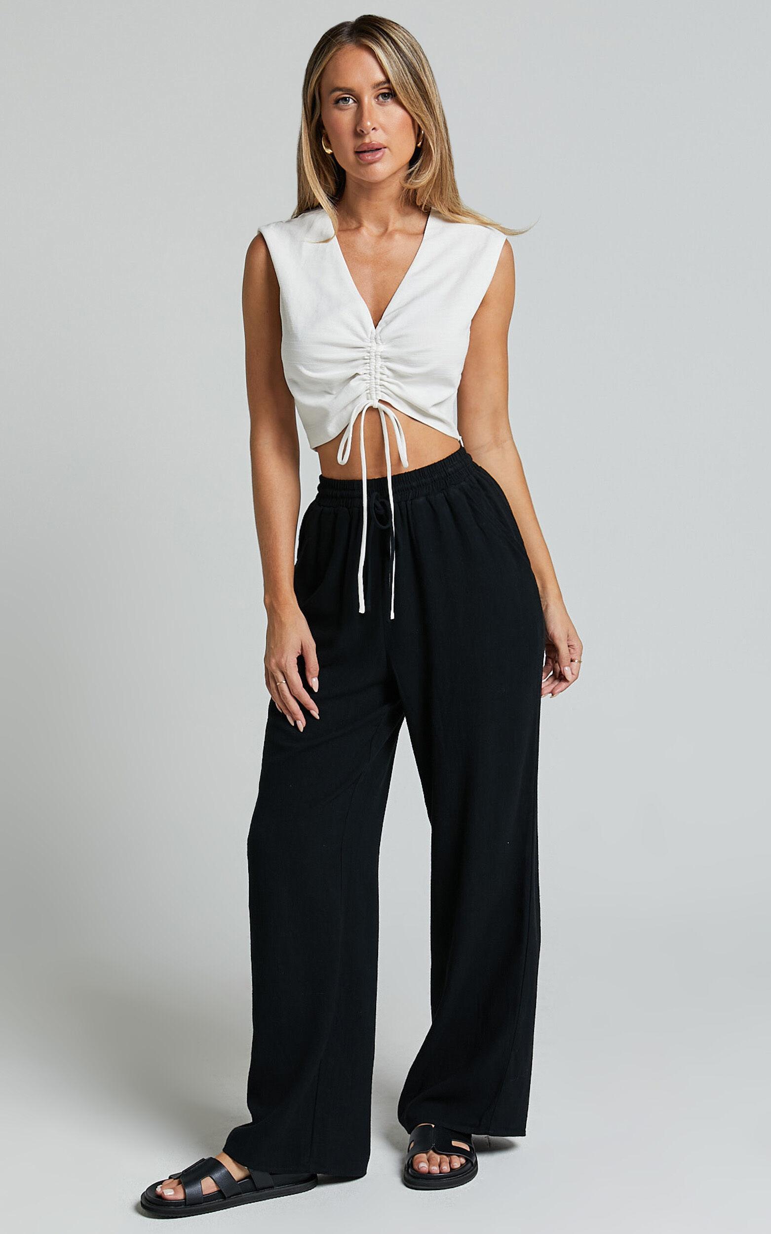 Kala Pants - Mid Waisted Relaxed Elastic Waist Pants in Black Product Image