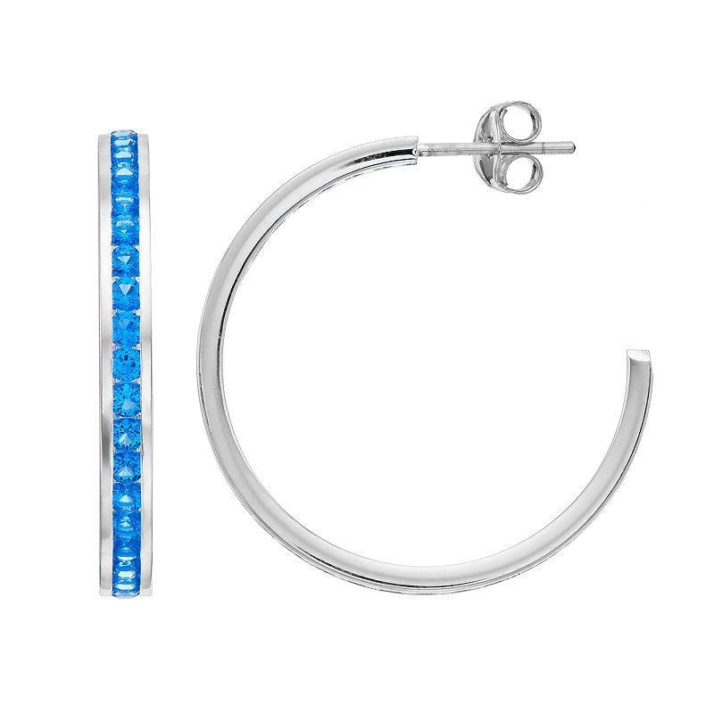 Traditions Jewelry Company Sterling Silver Channel-Set Blue Topaz Birthstone Hoop Earrings, Womens Product Image