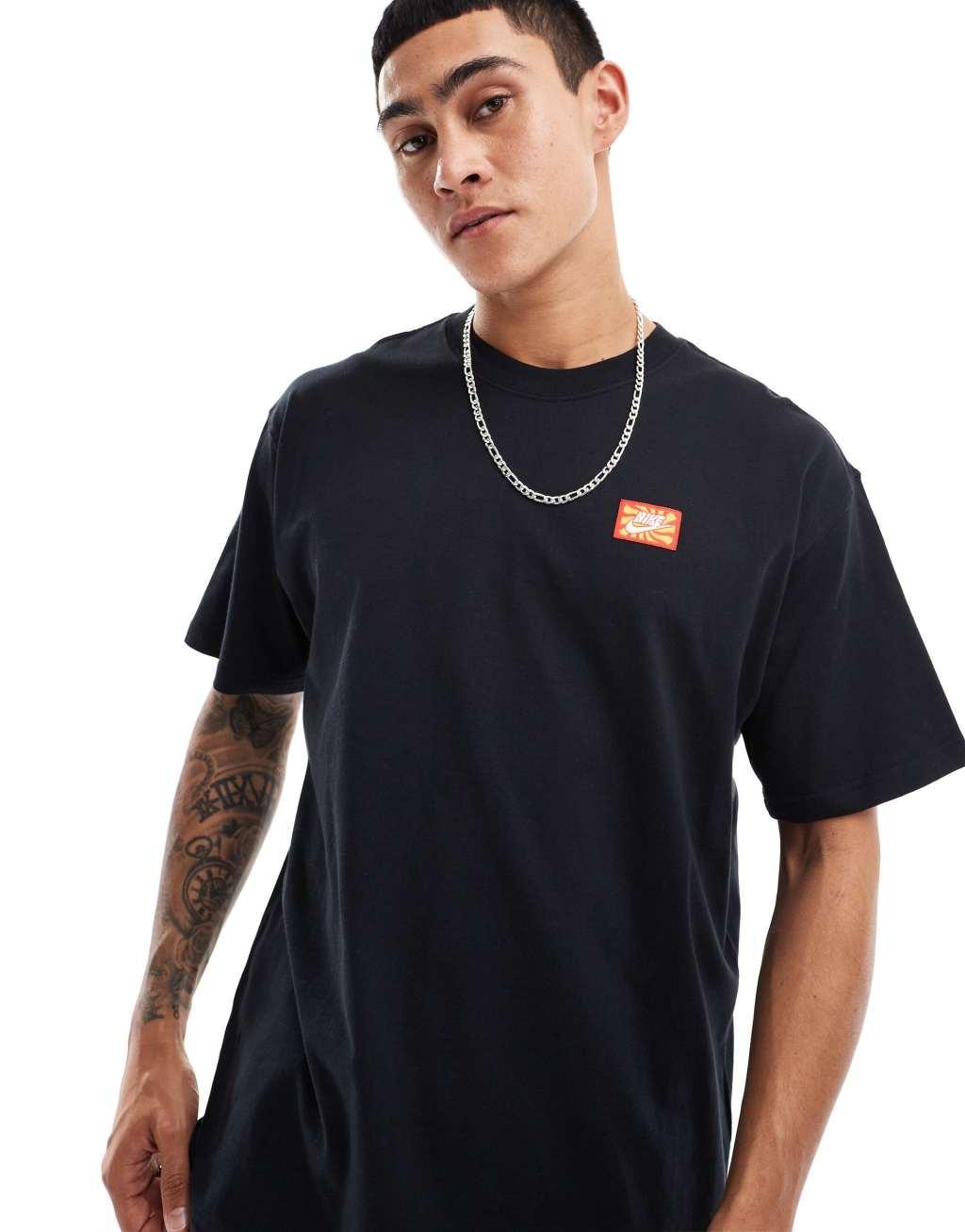 Nike festival back print T-shirt in black Product Image