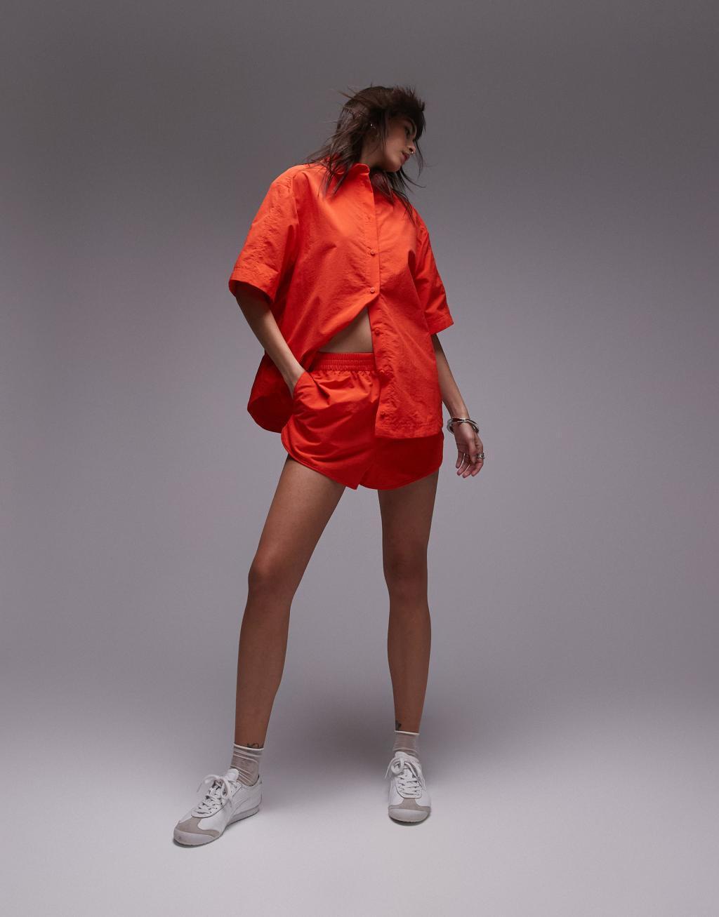 Topshop nylon runner shorts in red - part of a set product image