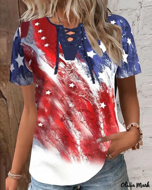 Olivia Mark – Womens Lace-Up Notch Neck Top with Patriotic Flag Print Product Image