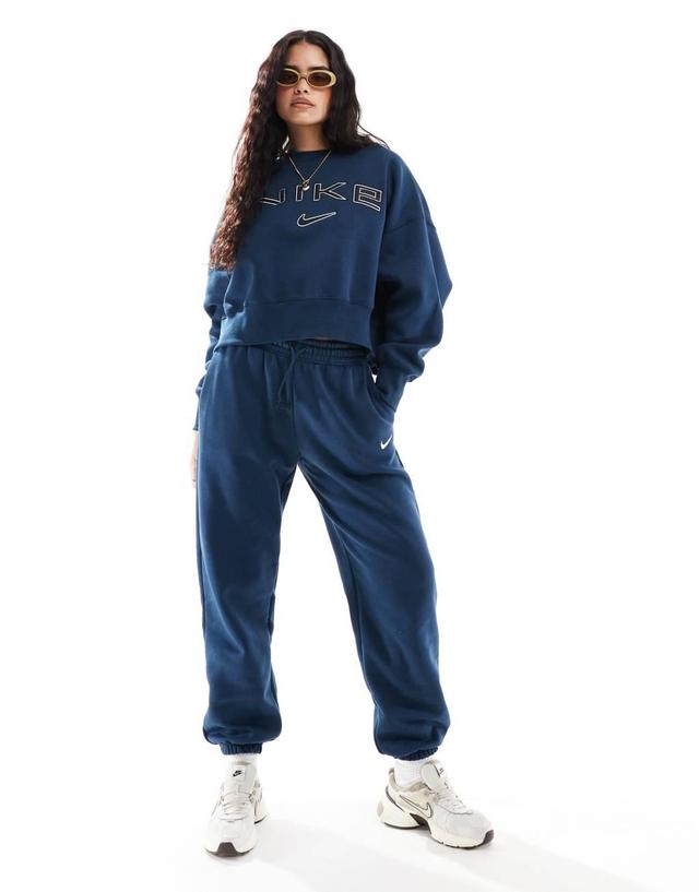 Nike Mini Swoosh sweatpants in navy Product Image