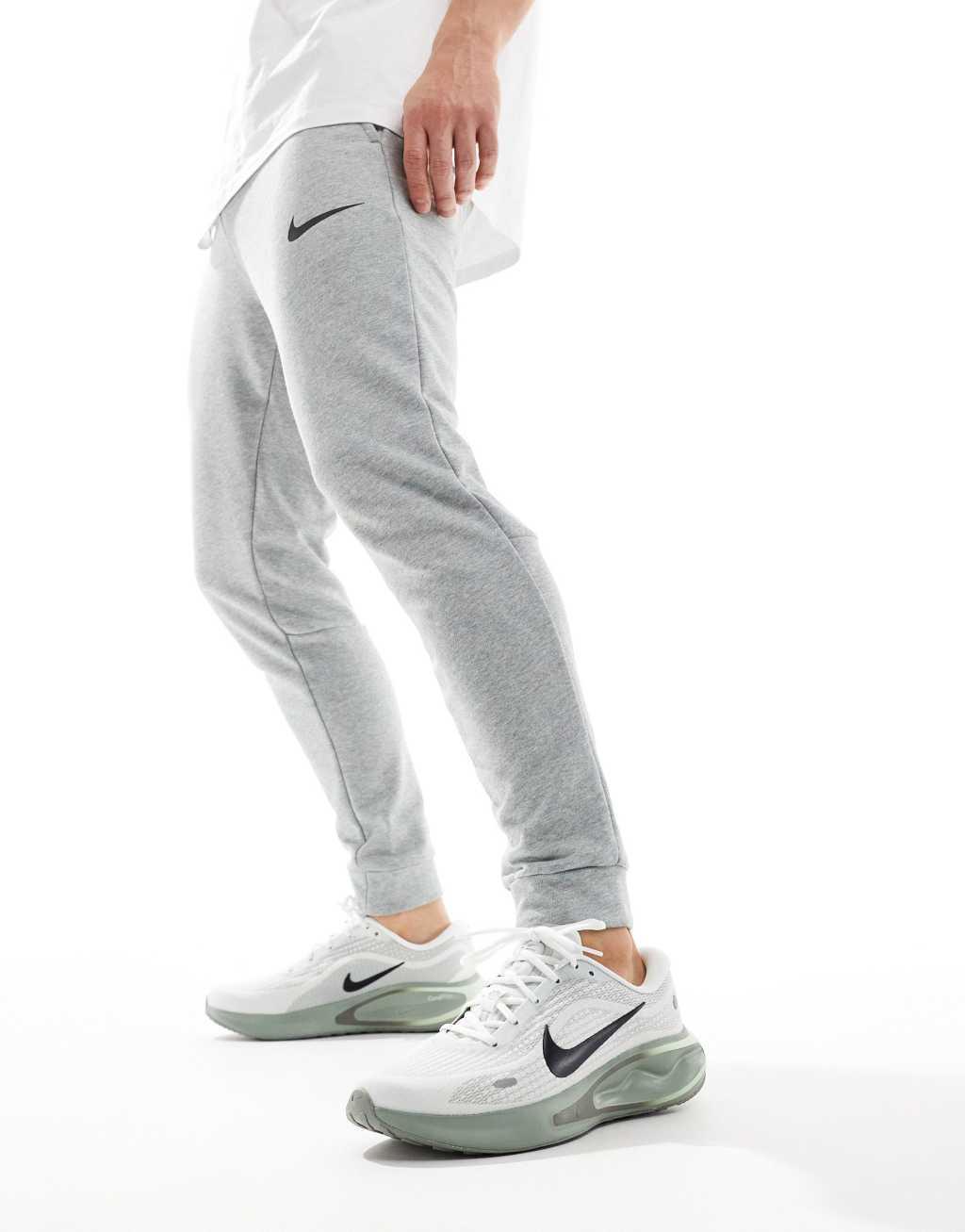 Nike Running Journey Run sneakers in white and light green Product Image