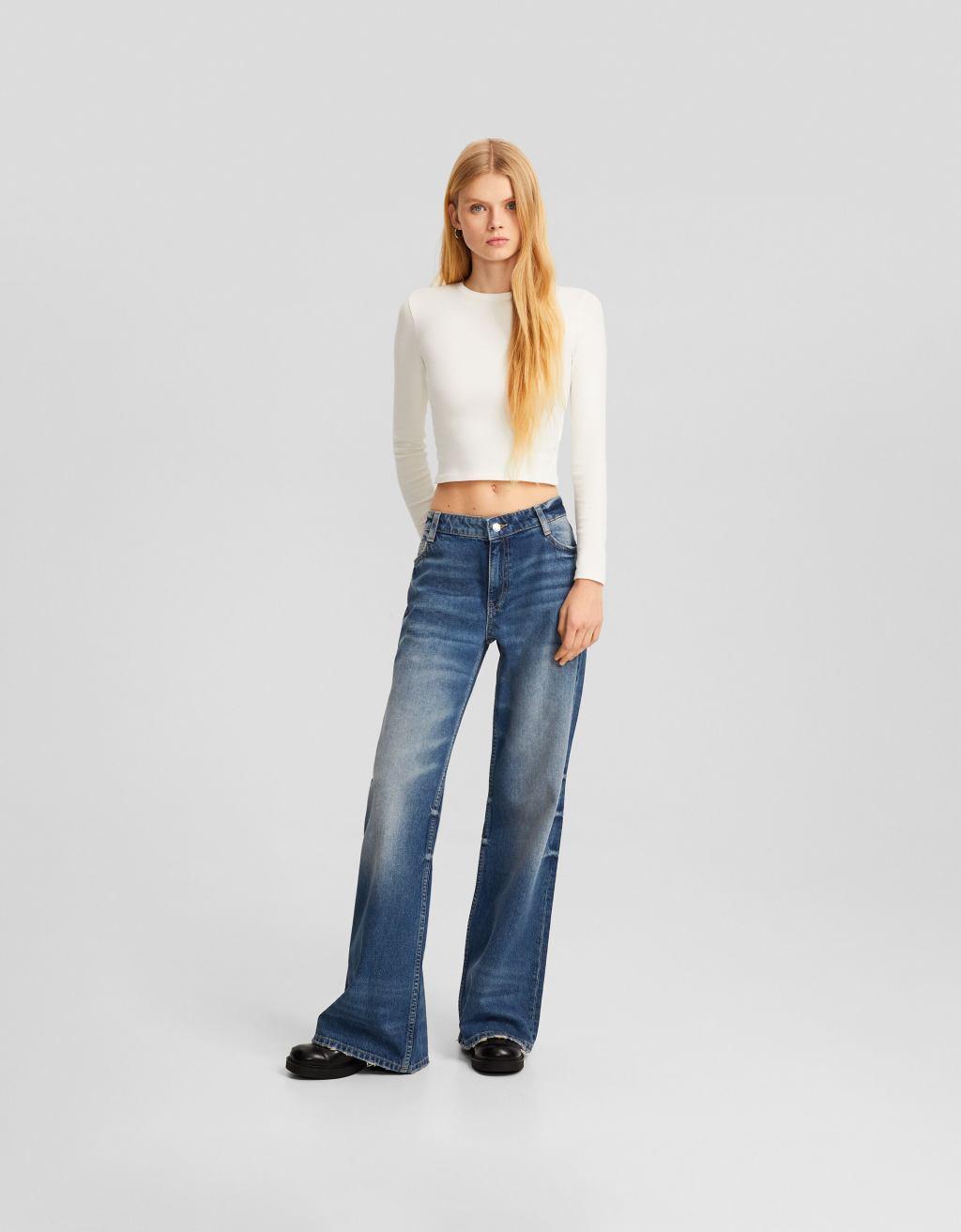 Bershka baggy flared jeans in dirty wash blue product image