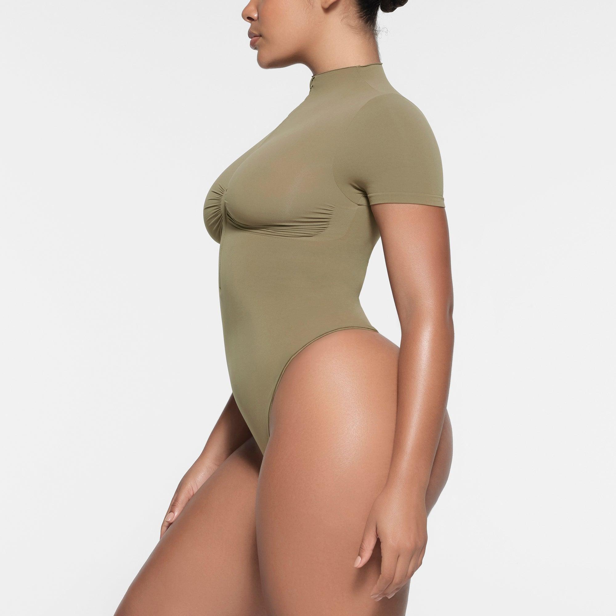 SEAMLESS SCULPT ZIP FRONT T-SHIRT THONG BODYSUIT | ARMY Product Image