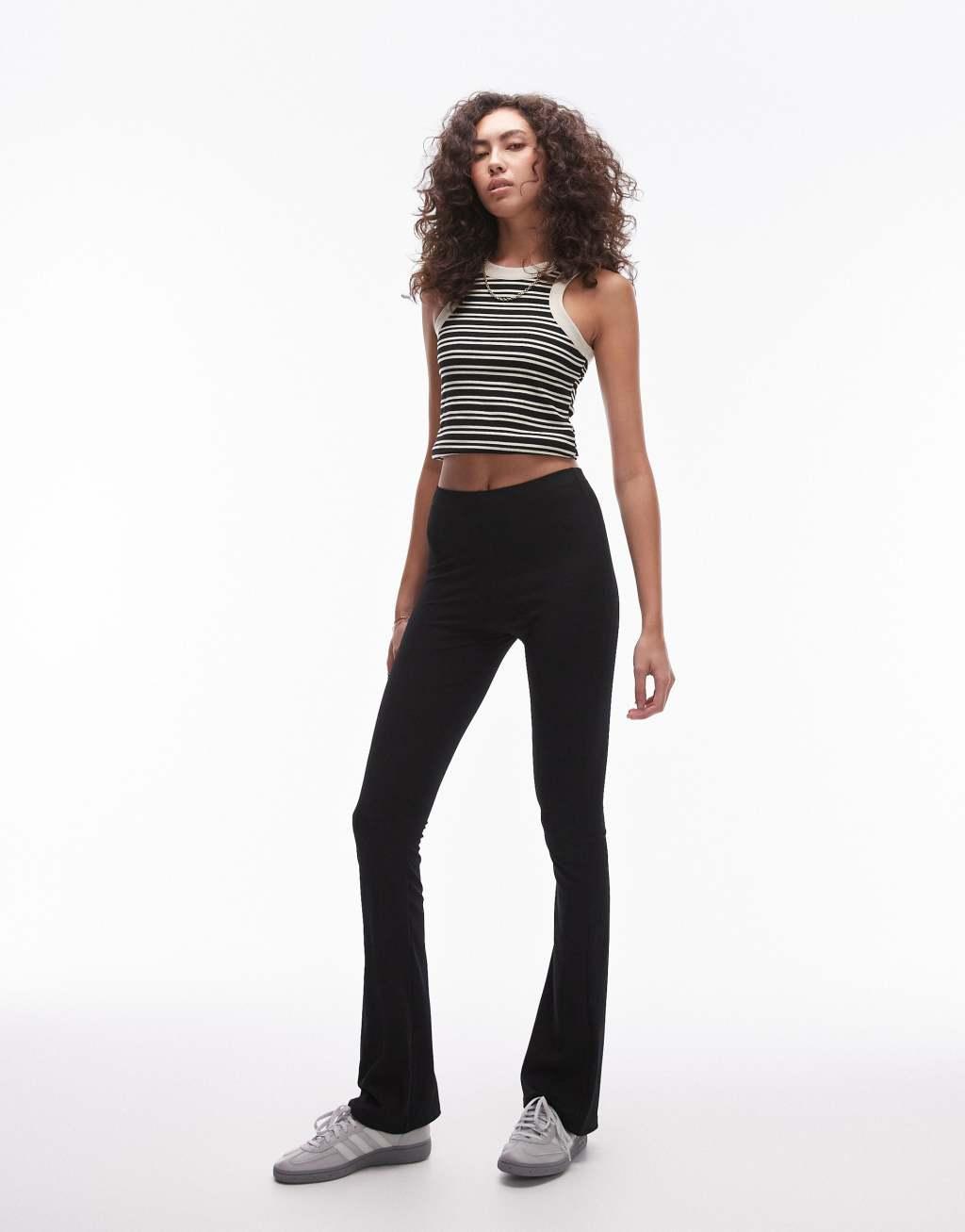 Topshop Tall skinny ribbed flared pants in black Product Image