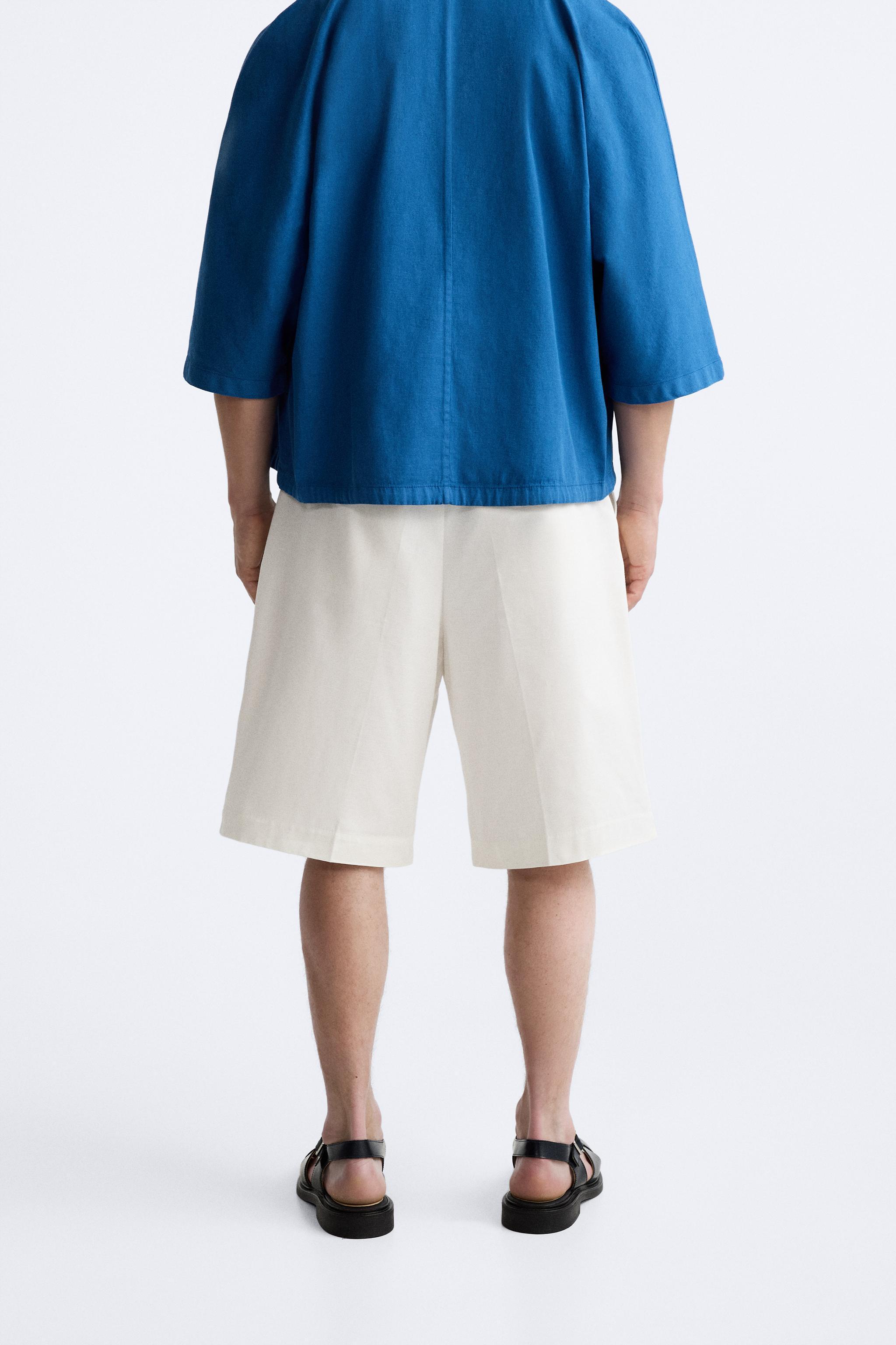 PLEATED BELTED SHORTS Product Image