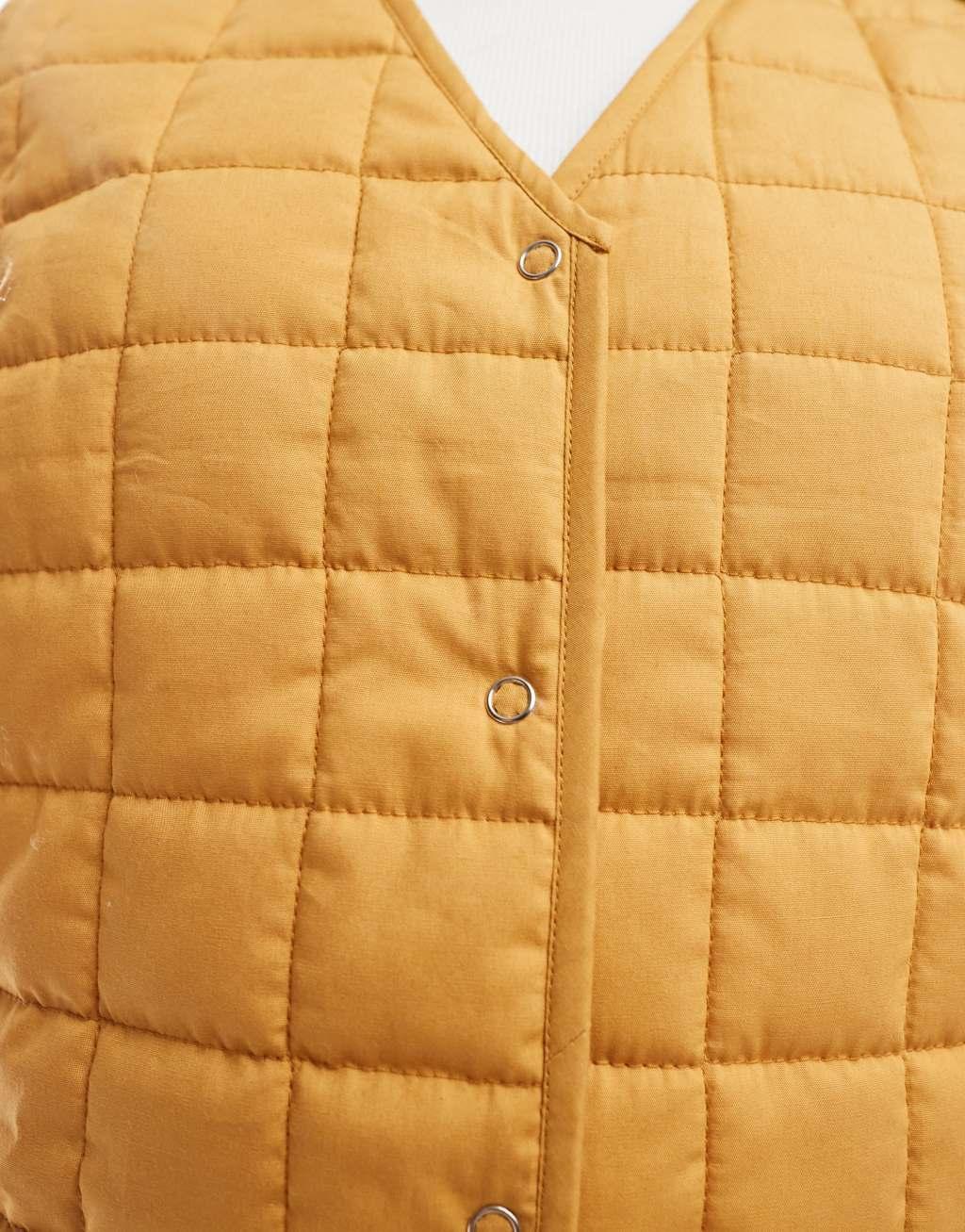 ASOS DESIGN quilted vest in mustard Product Image