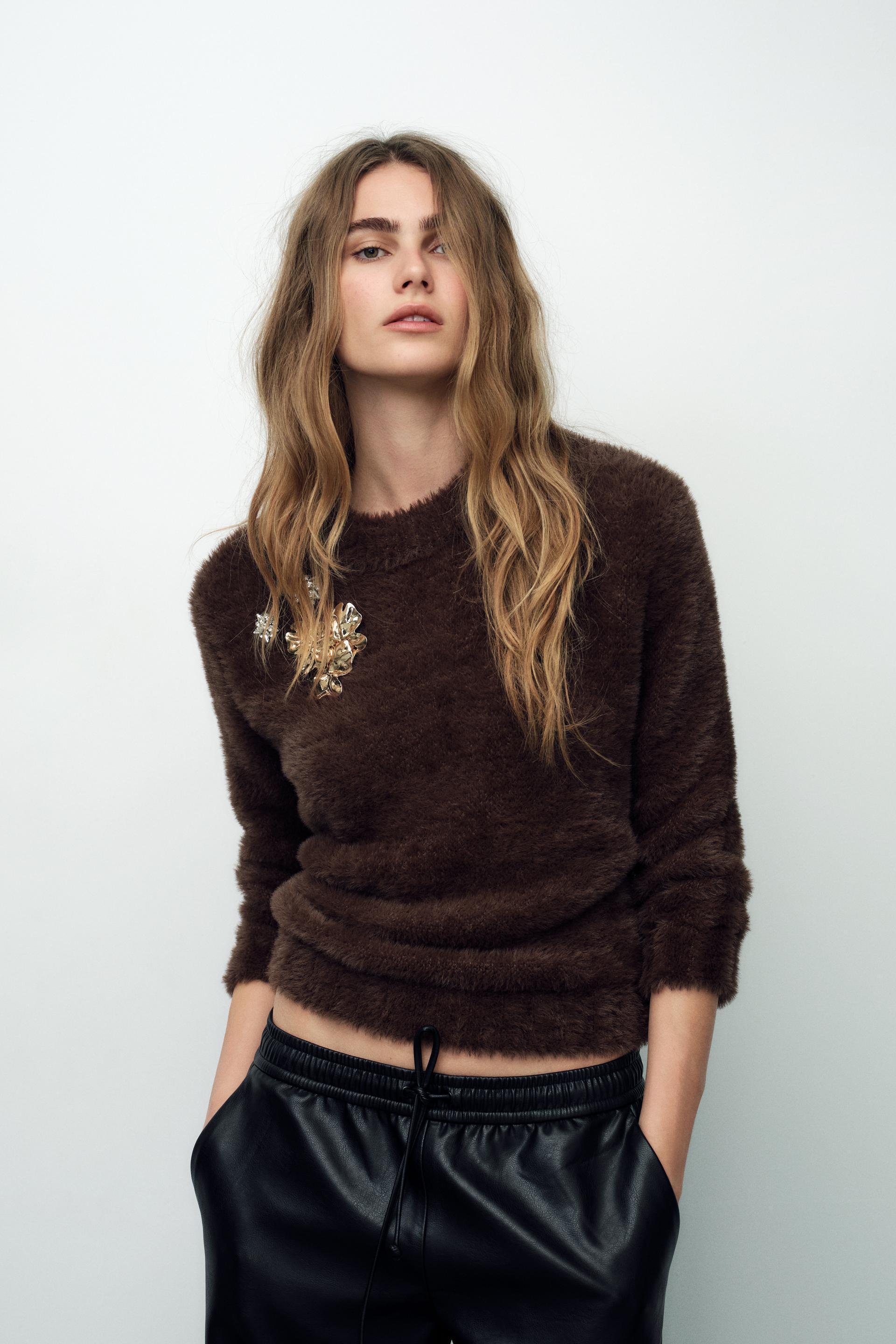 FAUX FUR KNIT SWEATER WITH BROOCHES Product Image