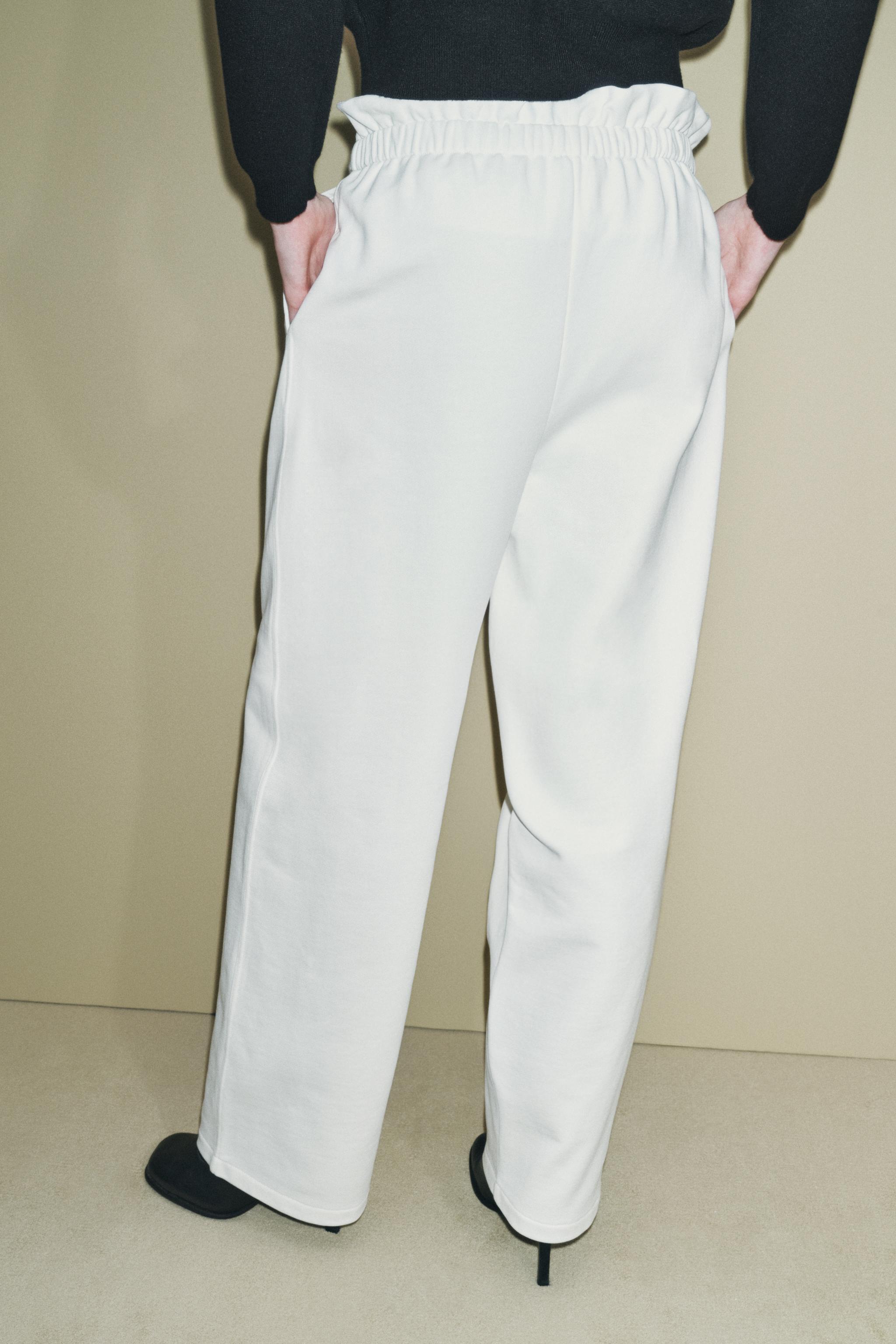 BELTED JOGGING PANTS Product Image