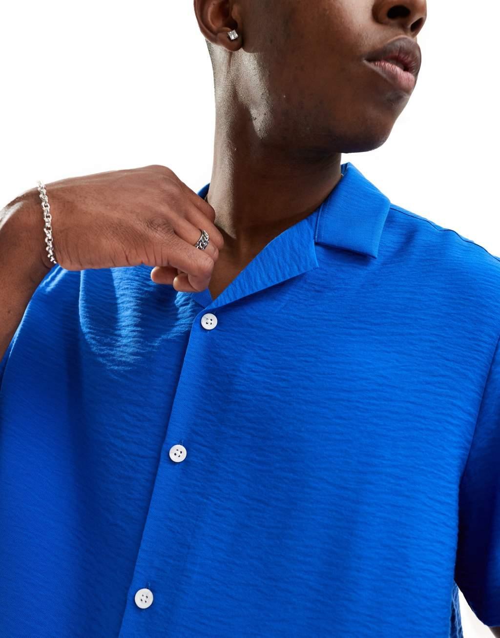 ASOS DESIGN short sleeve relaxed revere shirt in blue wrinkle Product Image