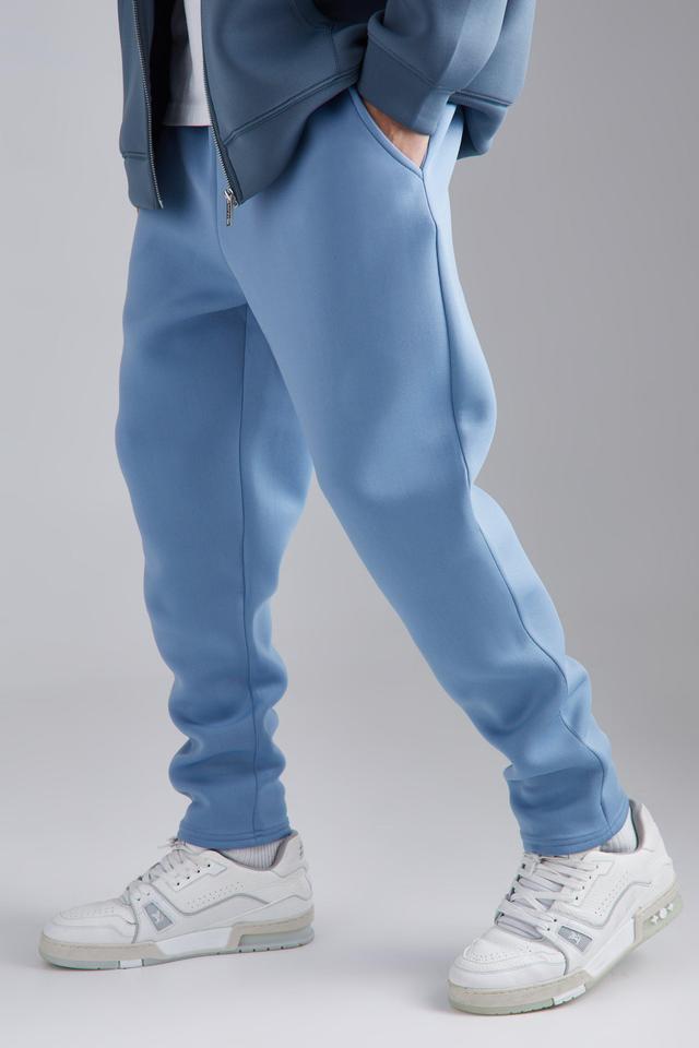 Mens Blue Slim Tapered Cropped Bonded Scuba Jogger, Blue Product Image