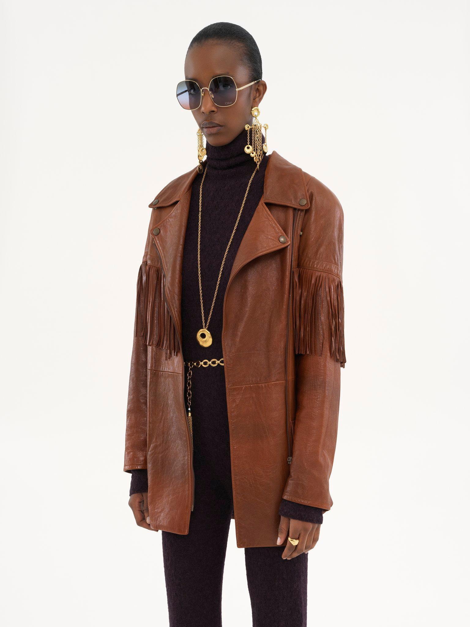 Belted fringed jacket in leather Product Image