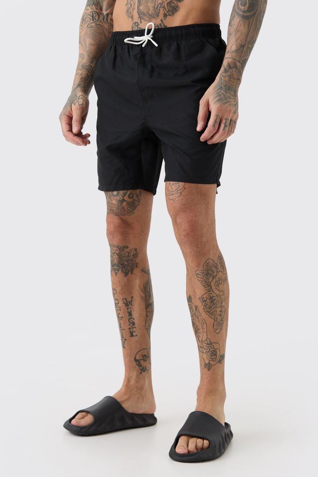 Tall Plain Mid Length Swim Trunks | boohooMAN USA Product Image